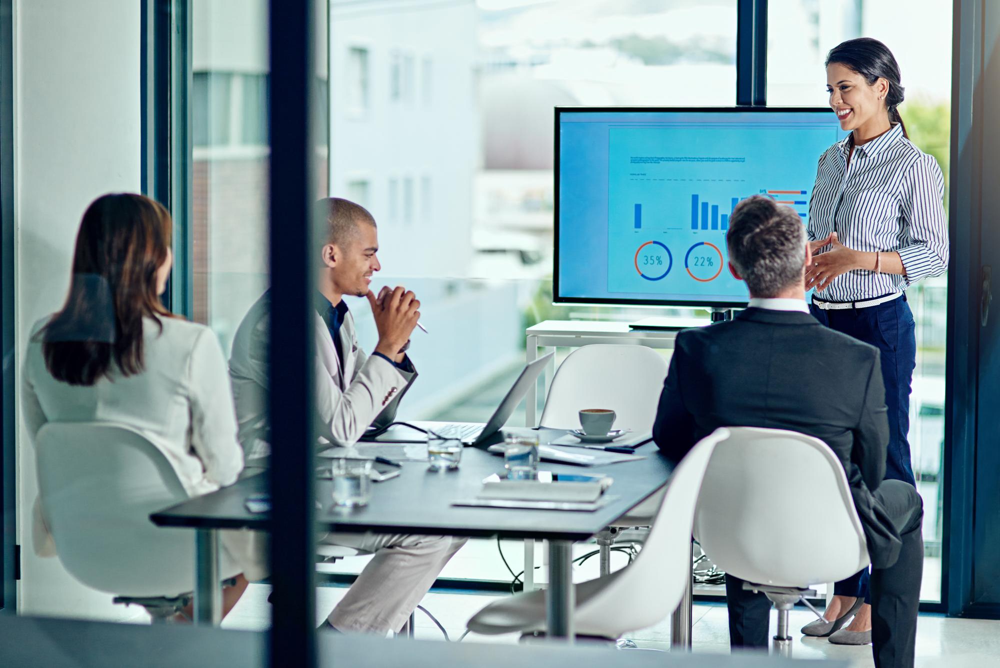 Corporate transformation workshop led by experienced management consultants in boardroom